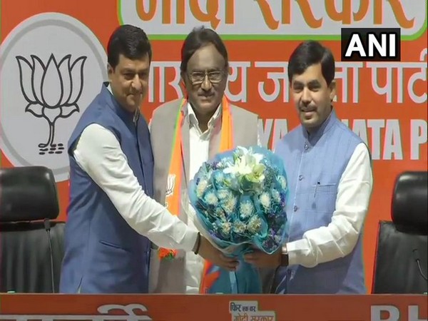 Congress leader Dr S Krishna Kumar joining BJP in presence of Union Minister Shahnawaz Hussain and party leader Anil Baluni on Saturday in New Delhi.