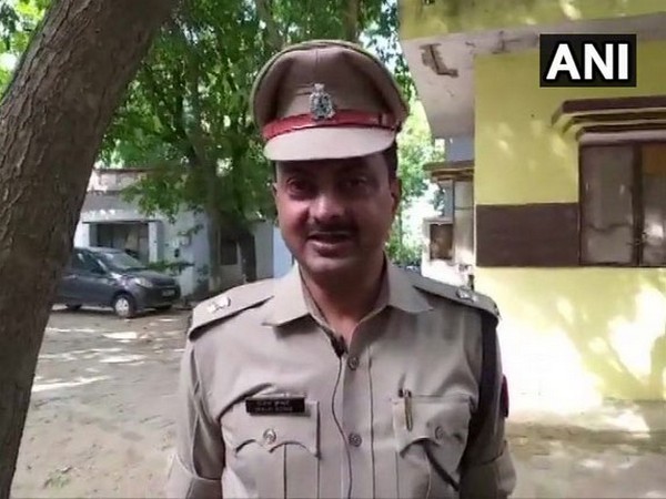 Senior Superintendent of Police (Etah) Sanjay Kumar speaking to reporters in Etah, Uttar Pradesh.