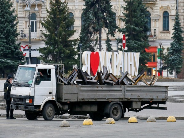 A car loaded with antitank obstacles is parked near an installation in central Kyiv. (Photo Credit - Reuters)