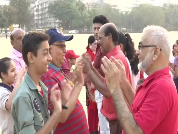 Senior citizens celebrates Valentine's Day with laughter club in Mumbai on Friday. Photo/ANI