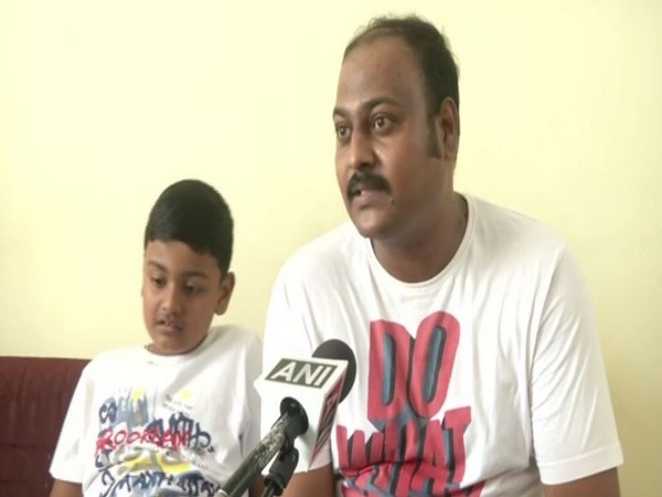 Kevin Raahul and Father Raju speaking to ANI (Photo/ANI)