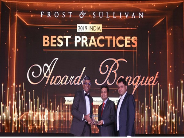 Abhishek Sinha, COO and Board Member, L&T Technology Services receives the Award from Mr. Anand S, Vice President, Frost and Sullivan