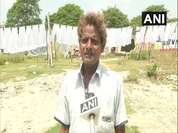 Washermen resume services in UP's Lucknow amid #Unlock1. (Photo/ANI)