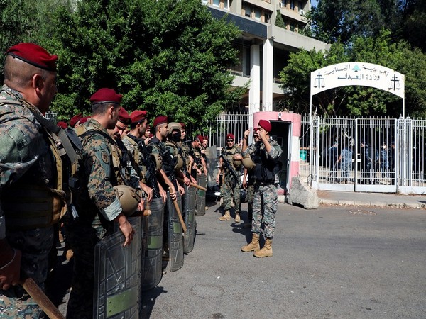 Army soldiers stand guard ahead of a protest in Beirut. (Photo Credit - Reuters)