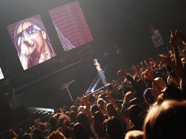 Lil Wayne performing at a concert