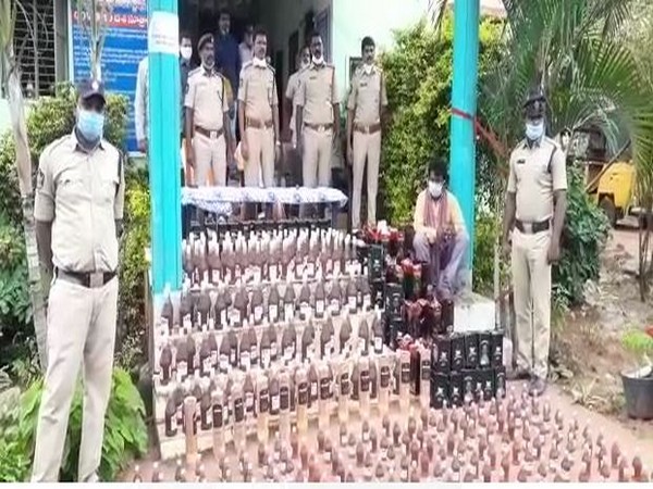 Liquor bottles seized in Andhra Pradesh's West Godavari district on Thursday. Photo/ANI