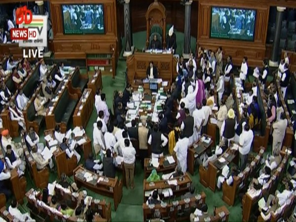 Opposition members raises slogans in Lok Sabha on Monday demanding release of NC leader Farooq Abdullah.