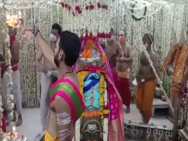 Priests performing the the Bhasma Aarti at Mahakaleshwar Temple on Monday (Photo/ANI)