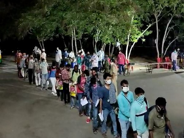 Migrant labourers at Mangalagiri railway station. (Photo/ANI)
