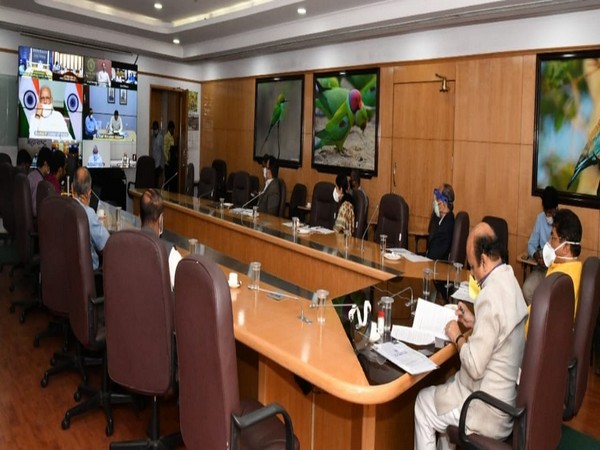 PM Modi during flood review meeting via video conferencing. (Photo/ANI)