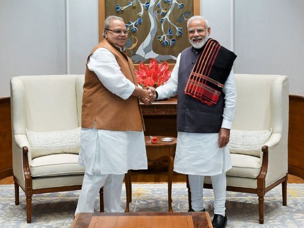 Prime Minister Narendra Modi with Satya Pal Malik on Saturday in New Delhi. Photo/PMO official Twitter account