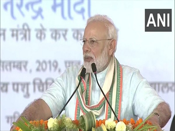 PM Narendra Modi addresses a gathering in Mathura on Wednesday. [Photo/ANI]