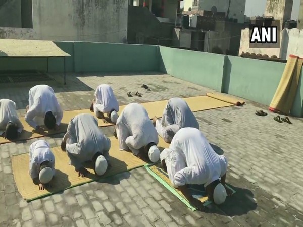 People celebrate Eid-ul-Fitr at their homes in Moradabad. Photo/ANI 
