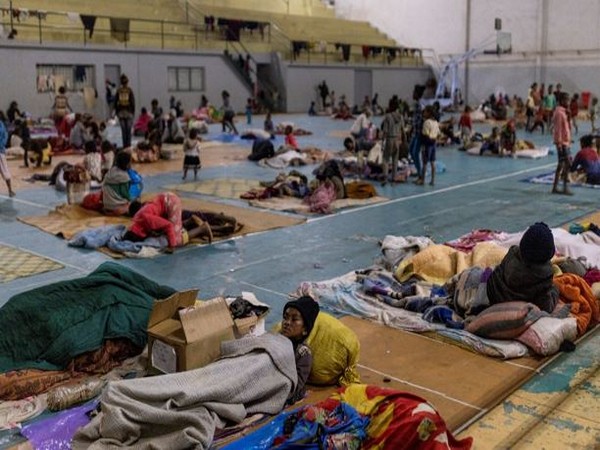 Locals find shelter at an evacuation centre, as Cyclone Batsirai sweeps Madagascar (Photo Credit: Reuters)