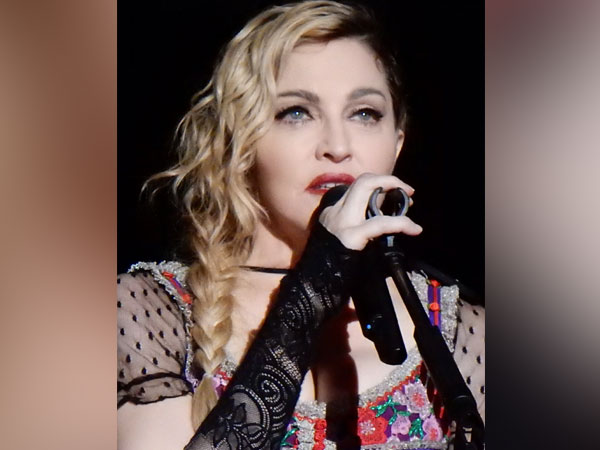 Musician, actor Madonna. 