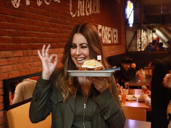 Mahima Chaudhry relishing food at Bruxie.   