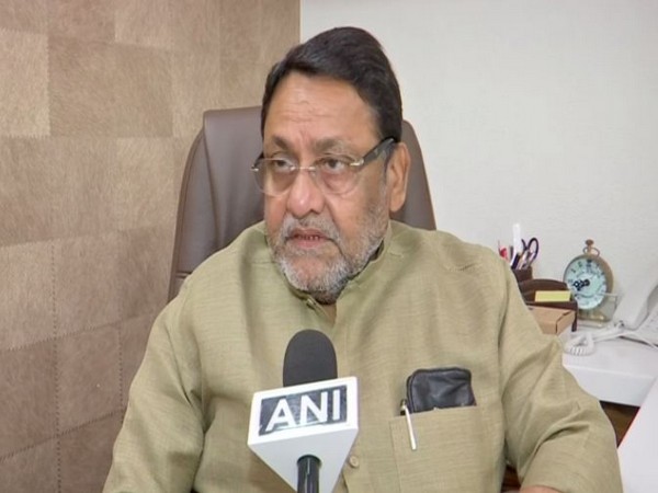 Nationalist Congress Party (NCP) spokesperson Nawab Malik speaking to ANI in Mumbai on Friday. (Photo/ANI)
