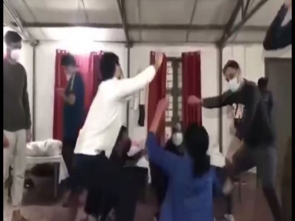 Students rescued from China dancing at the quarantine facility in Manesar in Haryana on Sunday. Photo/ANI