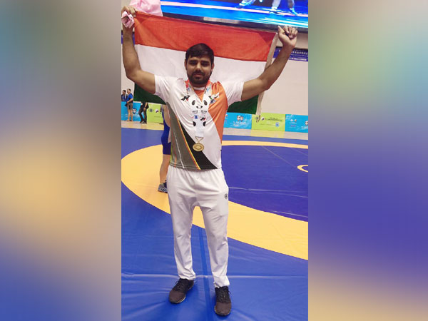 Assistant-Sub-Inspector of Haryana Police Manjit, who won gold at WPFG in wrestling. 
