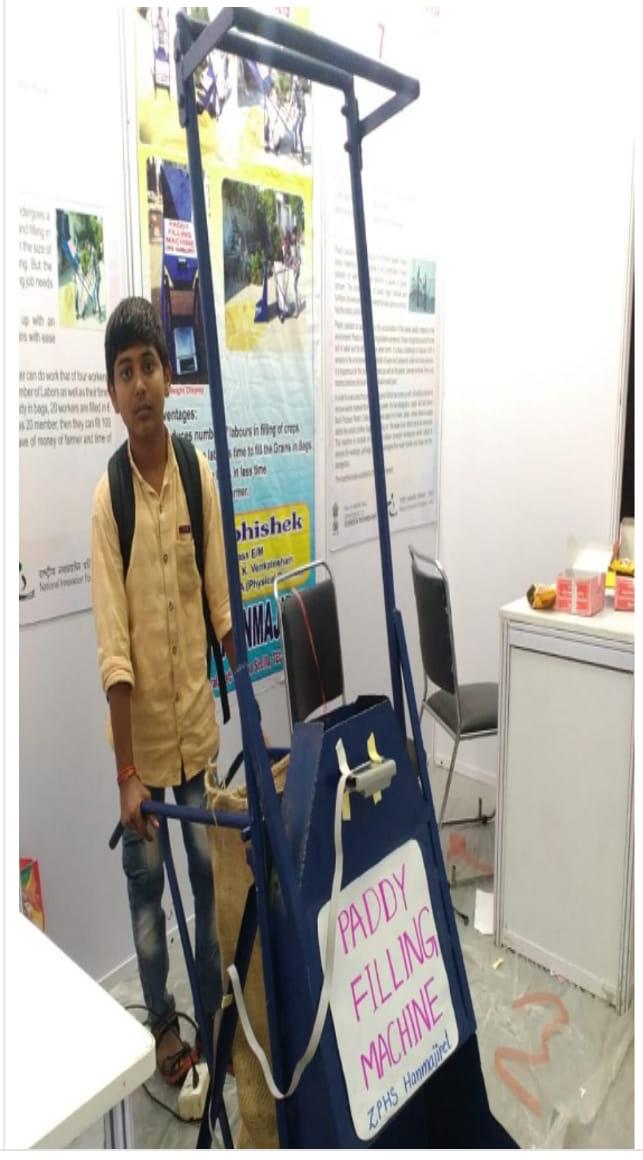 Marripalli Abhishek with paddy filling machine