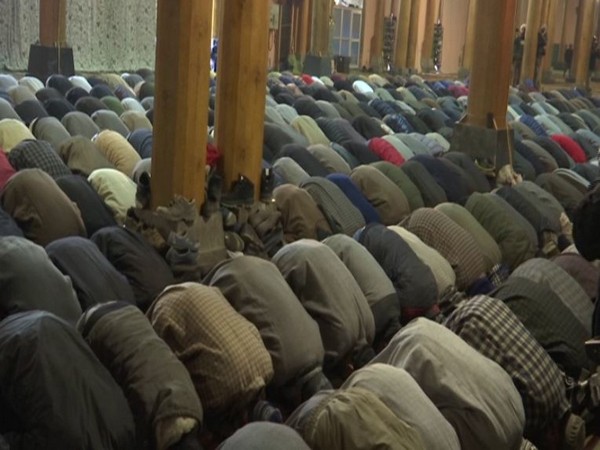 People offering namaz at historic Jamia Masjid in Srinagar's Nowhata on Friday. (Photo/ANI)