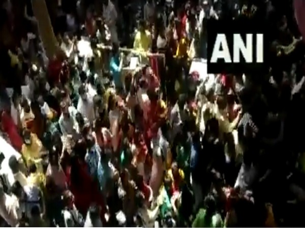 Crowd of devotees flouting COVID-related guidelines at Shri Bankey Bihari Ji Temple in Vrindavan on Friday. (Photo/ANI)