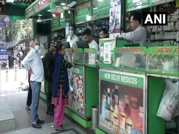 People at a medical store in New Delhi. Photo/ANI