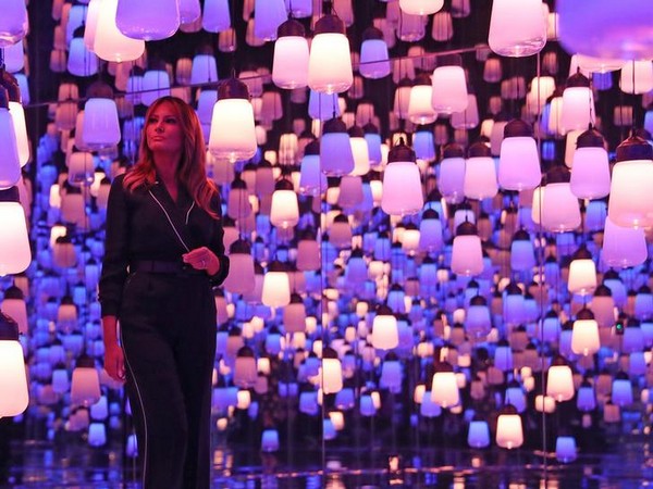 Melania Trump tours the teamLab Borderless exhibit at the Mori Building Digital Art Museum in Tokyo on Sunday