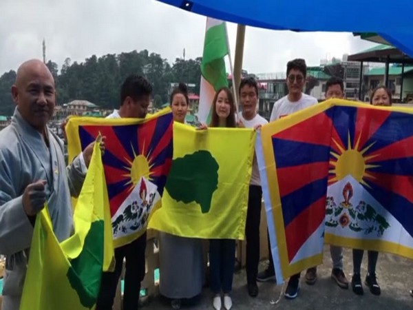 Members of Tibetan Youth Congress cheering for the Indian Army, government on Monday. Photo/ANI