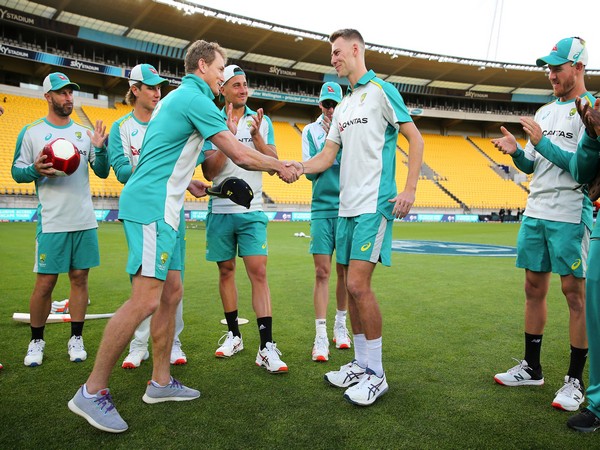 Pacer Riley Meredith getting his debut cap from George Bailey (Photo/ ICC Twitter)