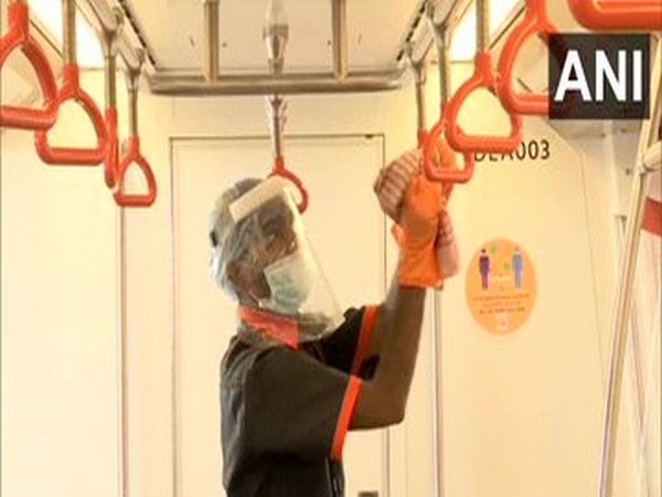Metro authorities undertakes sanitization work in Ahmedabad. Photo/ANI