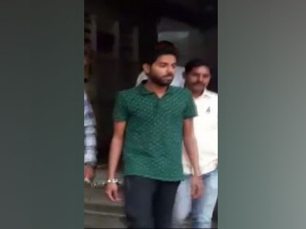 The accused Aditya Mhatre (in green shirt) on Friday. Photo/ANI