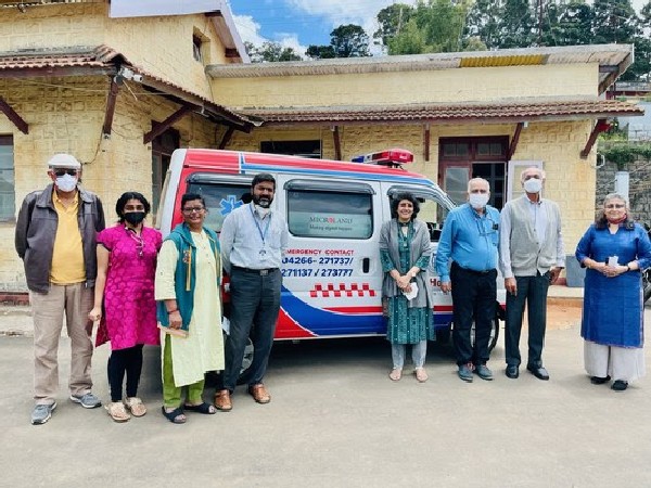Kalpana Kar (extreme right) of Microland Foundation handing over ambulance to Dr Tony Abraham Thomas, Neurosurgeon and Medical Superintendent, Kotagiri Medical Fellowship Hospital (fourth from left).