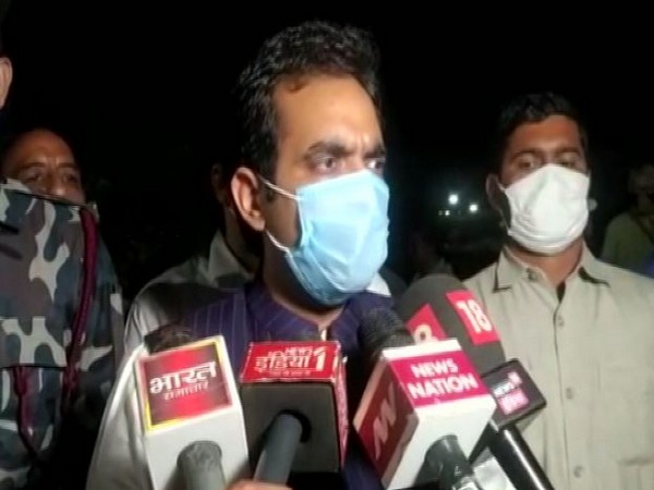 Noida MLA Pankaj Singh speaking to reporters on Tuesday.