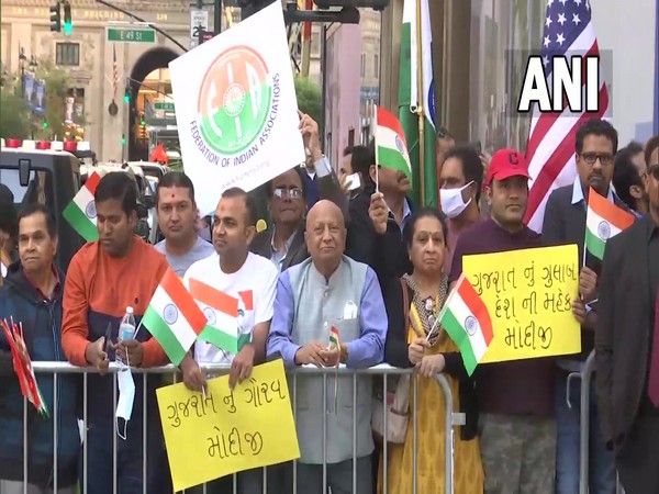 Members of the Indian diaspora gathered outside the hotel in New York on Saturday.