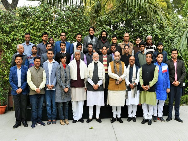 Photo from last year's Prime Minister Modi with BJP staff.