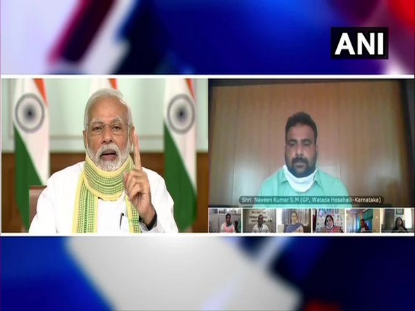 Prime Minister Narendra Modi interacting with Sarpanchs from across the nation via video conferencing on Friday.