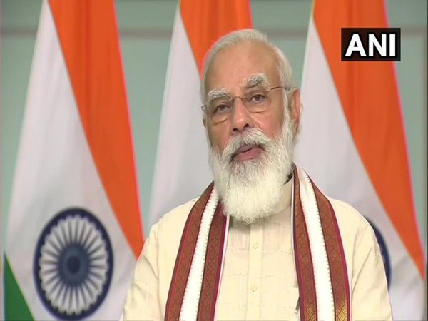 Prime Minister Narendra Modi speaking at the inauguration of houses built under PM Awas Yojana-Gramin in MP on Saturday. Photo/ANI