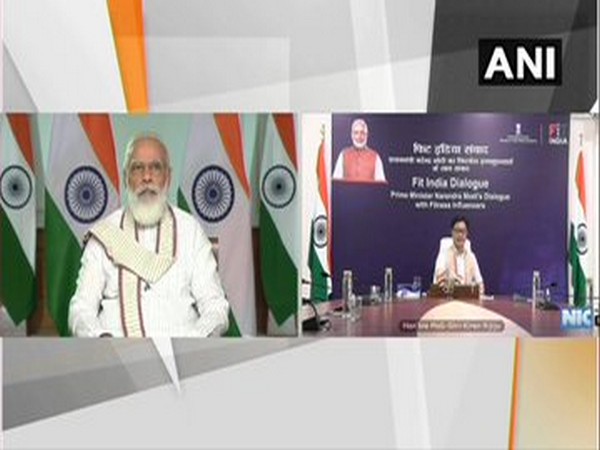 Prime Minister Narendra Modi and Union Minister Kiren Rijiju at the event held on Thursday. Photo/ANI