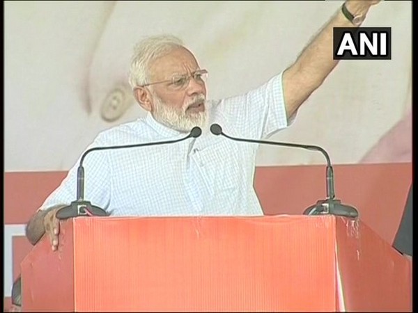 Prime Minister Narendra Modi speaking at public rally in Rohtak, Haryana on Sunday. (Photo/ANI)