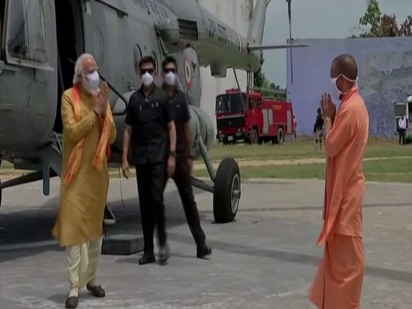 Prime Minister Narendra Modi received by Uttar pradesh Chief minister Yogi Adityanath on his arival in Ayodhya on Wednesday. (Photo/ANI)