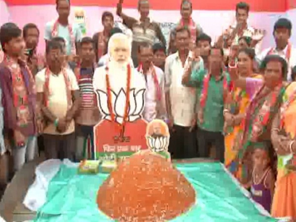 BJP workers in Jalpaiguri have prepared a 101 kg laddoo to wish Narendra Modi. Photo/ANI