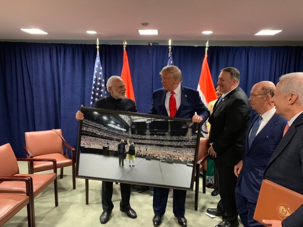 Prime Minister Narendra Modi presented a framed photograph from the Howdy Modi event to US President Donald Trump. (Picture tweeted by PMO)