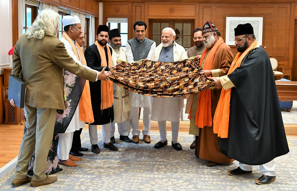 Prime Minister Narendra Modi with the Muslim delegation in Delhi on Saturday.