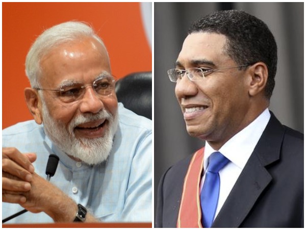 Prime Minister Narendra Modi  with his Jamaican counterpart Andrew Michael Holness (right)