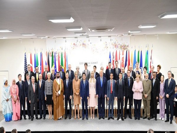 Leaders of G-20 countries pose for a group photograph during the two-day summit in Osaka on Saturday. (Photo Credits: MEA Twitter)