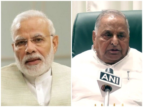 Prime Minister Narendra Modi and Samajwadi Party (SP) patriarch Mulayam Singh Yadav (right)