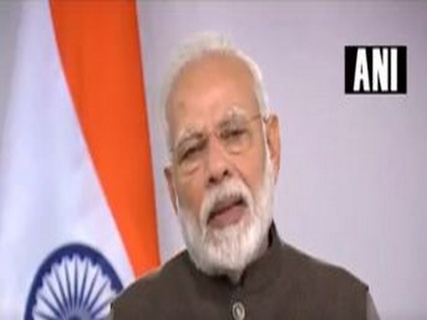 Prime Minister Narendra Modi interacting with beneficiaries of Pradhan Mantri Bhartiya Janaushadi Pariyojana. Photo/ANI