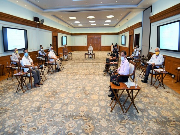 Prime Minister Narendra Modi on Monday chaired a high-level meeting with officials of MHA and NDMA over cyclone Amphan. (Photo courtesy: PIB)