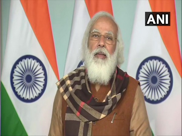 Prime Minister Narendra Modi interacting with beneficiaries and vaccinators of COVID-19 vaccination drive in Varanasi, via video conferencing on Friday.